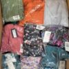 The photo shows a package with clothing in the category AR.