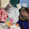The photo shows a package with clothing in the category SN.