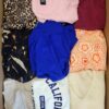 The photo shows a package with clothing in the category BSN.