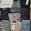 The photo shows a package with clothing in the category U.