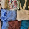 The photo shows a package with clothing in the category BSN.
