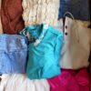 The photo shows a package with clothing in the category BSN.