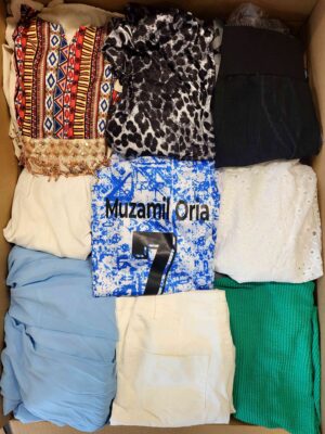 The photo shows a package with clothing in the category BSN.
