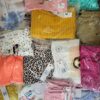 The photo shows a package with clothing in the category N.
