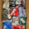 The photo shows a package with clothing in the category ABW.