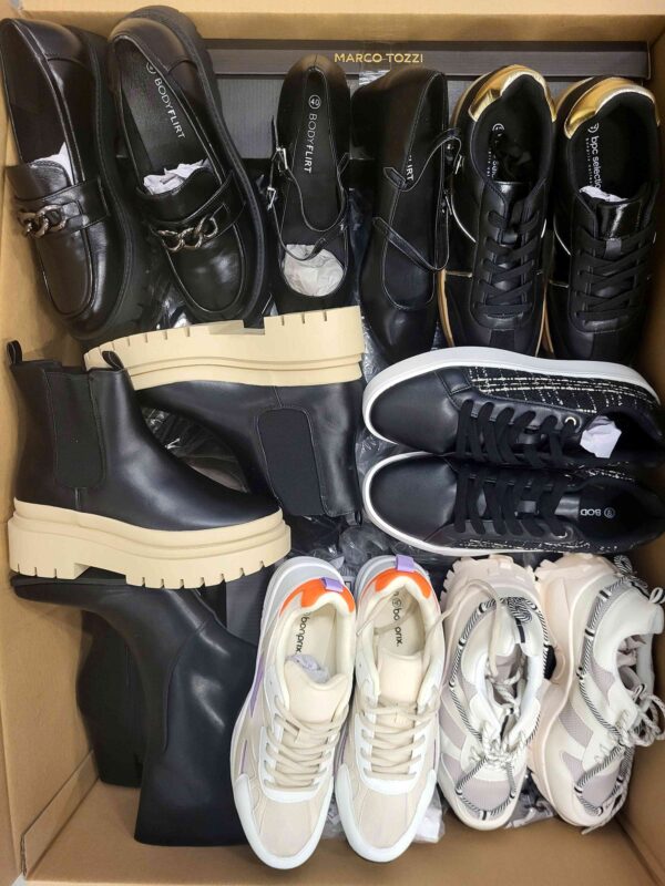 The photo shows a package with clothing in the category BPS.