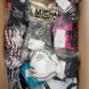 The photo shows a package with clothing in the category ABW.