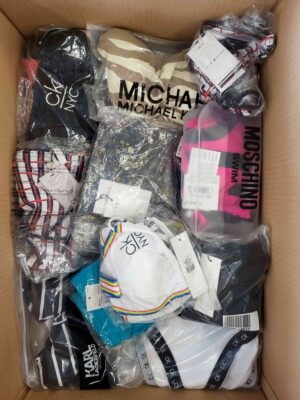 The photo shows a package with clothing in the category ABW.