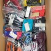 The photo shows a package with clothing in the category ABW.