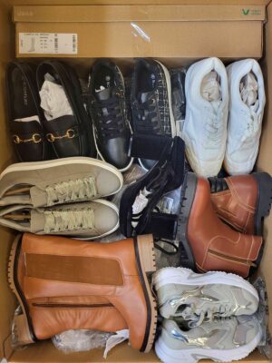 The photo shows a package with clothing in the category BPS.