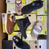 The photo shows a package with footwear in the category SM.