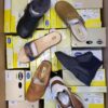 The photo shows a package with footwear in the category SM.