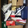 The photo shows a package with footwear in the category BS.