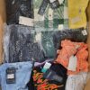 The photo shows a package with clothing in the category BB.