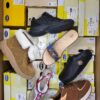 The photo shows a package with footwear in the category SM.