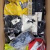 The photo shows a package with clothing in the category AU.