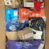The photo shows a package with clothing in the category AU.