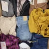The photo shows a package with clothing in the category TSC.