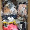 The photo shows a package with clothing in the category AU.