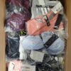 The photo shows a package with clothing in the category AU.
