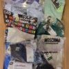 The photo shows a package with clothing in the category AU.