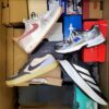 The photo shows a package with footwear in the category CS.