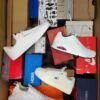 The photo shows a package with footwear in the category CS.