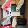 The photo shows a package with footwear in the category CS.
