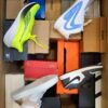 The photo shows a package with footwear in the category CS.