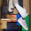 The photo shows a package with footwear in the category CS.