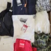 The photo shows a package with clothing in the category TSC.