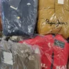 The photo shows a package with clothing in the category AJW.