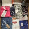 The photo shows a package with clothing in the category K.