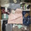 The photo shows a package with clothing in the category K.