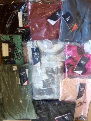 The photo shows a package with clothing in the category R.