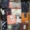 The photo shows a package with clothing in the category K.