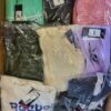 The photo shows a package with clothing in the category R.