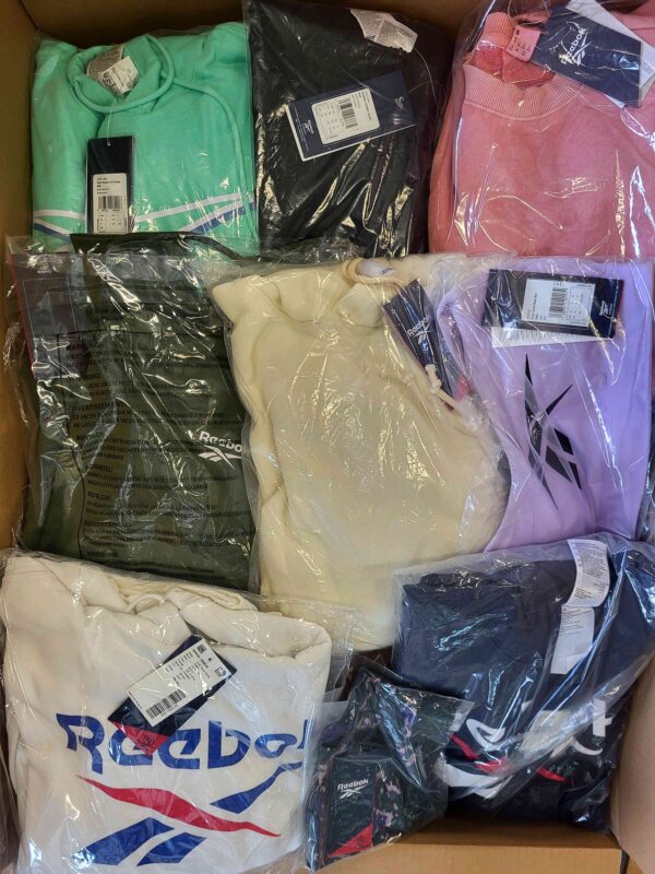 The photo shows a package with clothing in the category R.