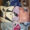 The photo shows a package with clothing in the category R.