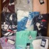 The photo shows a package with clothing in the category R.