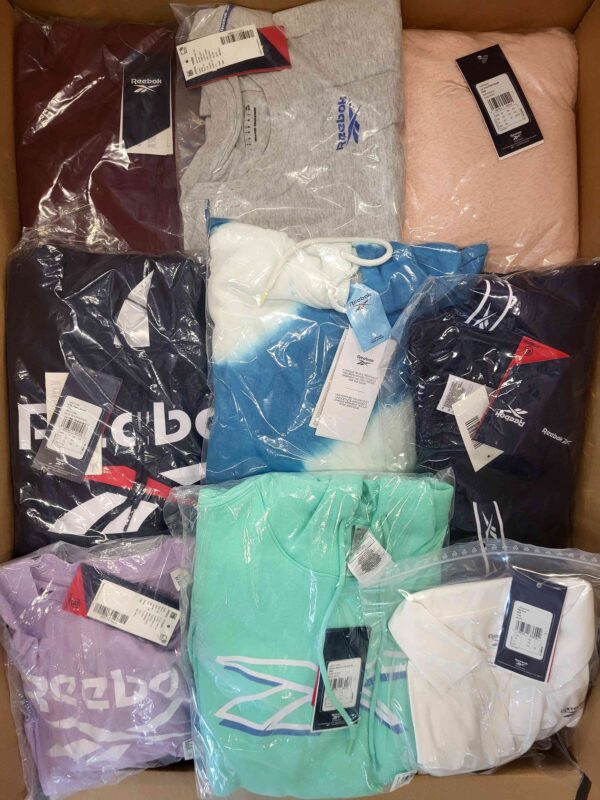 The photo shows a package with clothing in the category R.