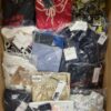 The photo shows a package with clothing in the category K.