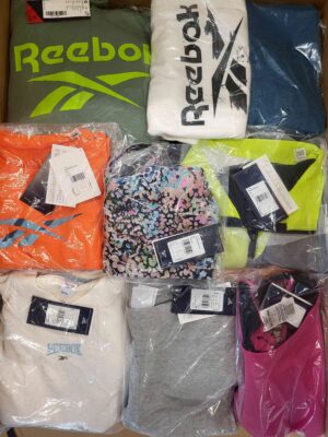 The photo shows a package with clothing in the category R.