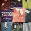 The photo shows a package with clothing in the category R.