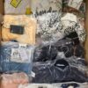 The photo shows a package with clothing in the category K.