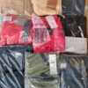 The photo shows a package with clothing in the category AM.