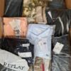 The photo shows a package with clothing in the category AM.