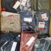 The photo shows a package with clothing in the category AM.