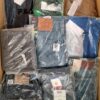 The photo shows a package with clothing in the category AM.