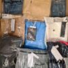 The photo shows a package with clothing in the category AM.